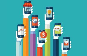 arms holding mobile phones in the air: mobile marketing